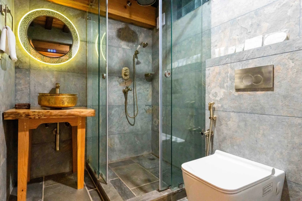 Heritage themed bathroom of a hotel room in Patan.