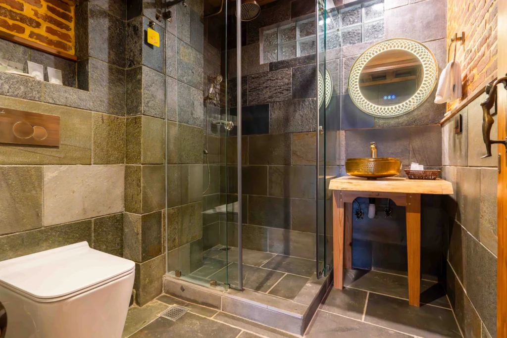 Bathroom of a hotel room with bathroom amendities.