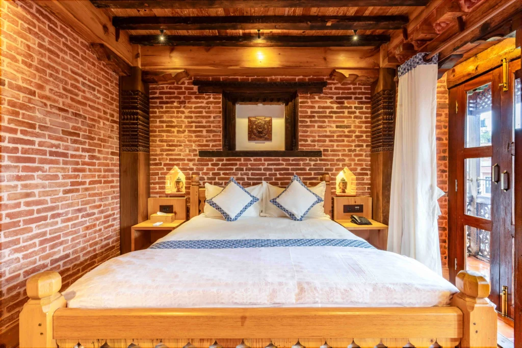 Traditionally designed hotel room located at Patan, Lalitpur along with other hotel amenities.