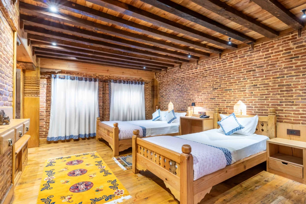 Hotel room at Patan which is designed using traditional Nepali concepts along with other hotel amenities.