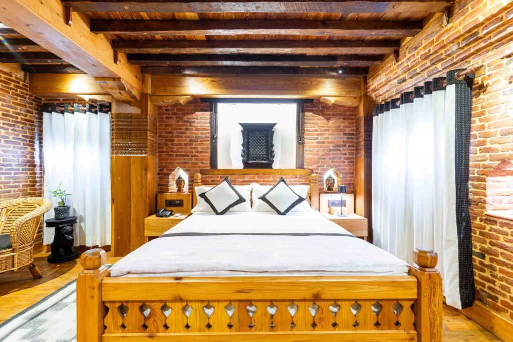 Traditional Nepali heritage inspired hotel room at Patan with other hotel amenities.